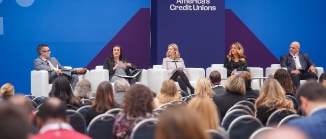 Panel in front of crowd